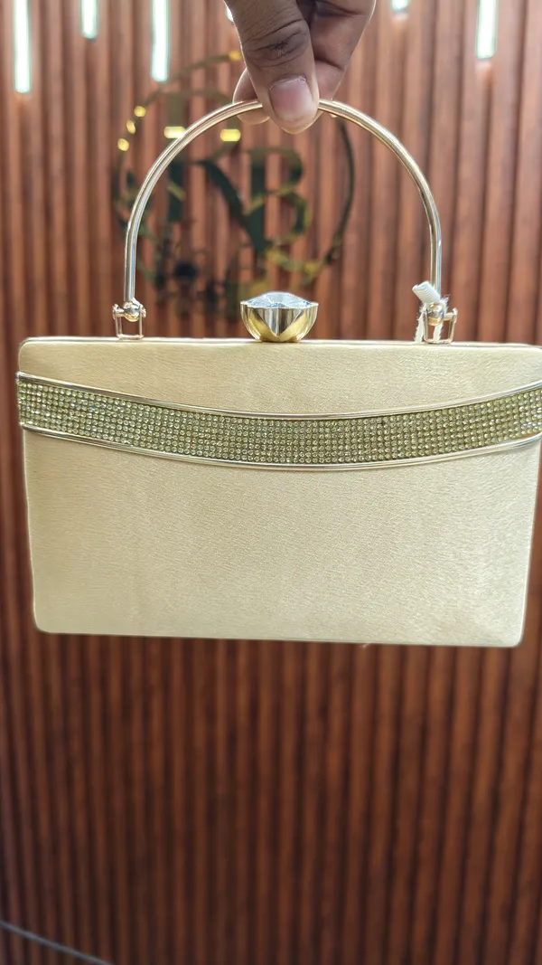 Gold_Textured_Hardcase_Clutch_Handbag_for_Women
