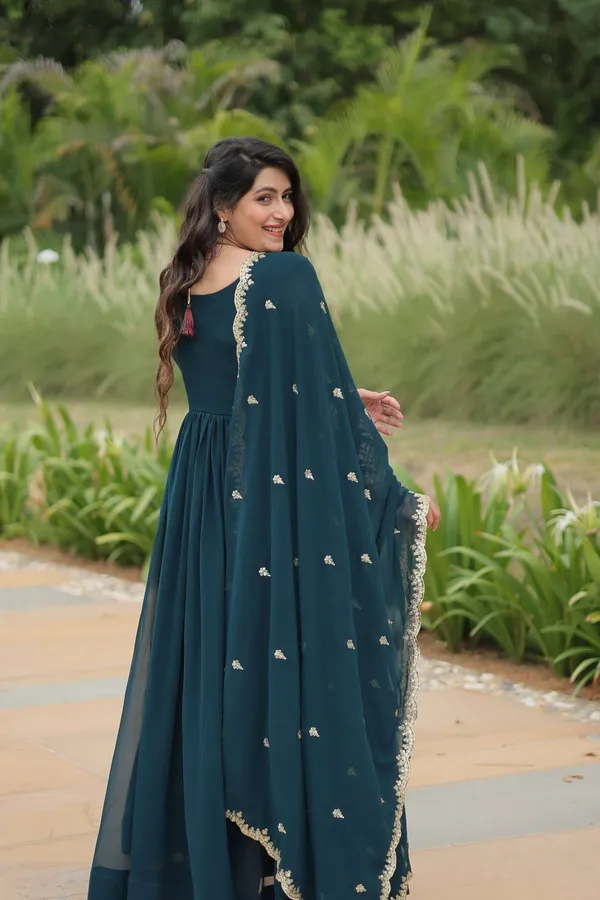Teal_Blue_Elegant_Kutchi_Gamthi_Work_Reyon_Gown_With_Heavy_Flair