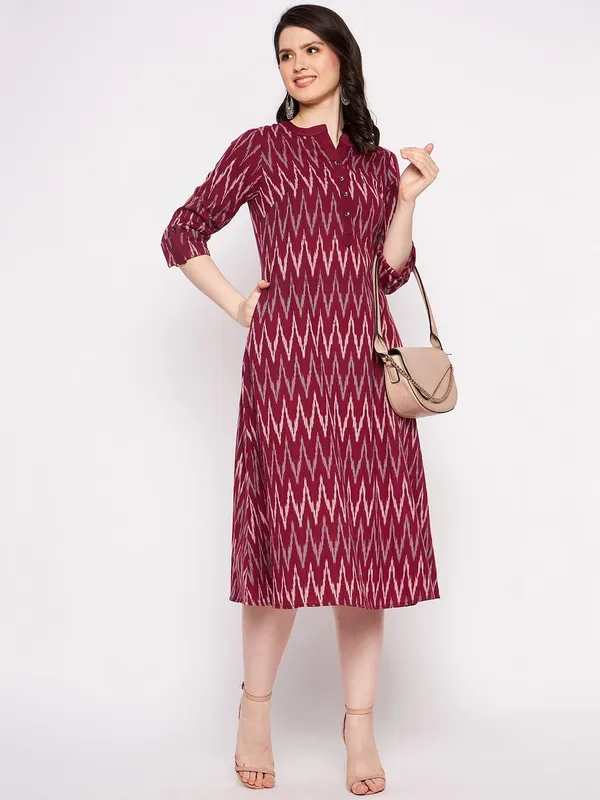 Maroon_Cotton_Ikat_A-Line_Sleeveless_Kurta_With_White_Linen_Pant_For_Women