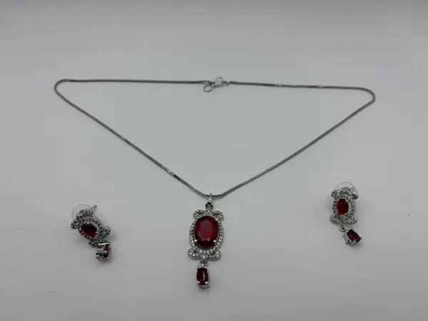 Silver_Red_American_Diamond_Necklace_And_Earrings_Set_For_Women