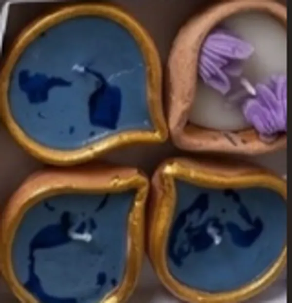 Wax_Festive_Assorted_Shape_Diya_Candle_Set_Blue_Pack_Of_4