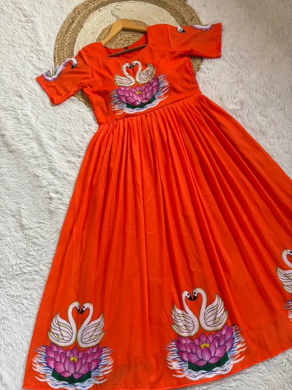 Radiant_Orange_Muslin_Gown_With_Hand_Painted_Swan_Khatli_Art