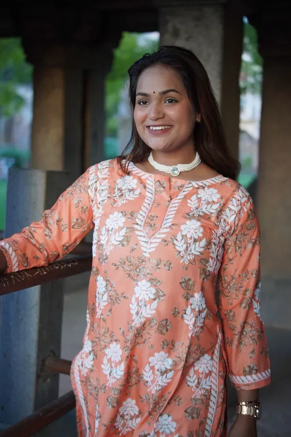 Orange_Buy_Mulmul_Cotton_Printed_Chikankari_Kurta_And_Plazzo_Set