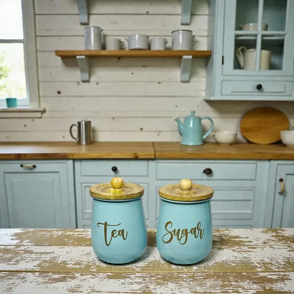 Aan_Decor_Metal_Kitchen_Storage_Canisters_With_Wooden_Lids_With_Lettering_Tea_And_Sugar_Containers_(Sky-_)_Pack_Of_2