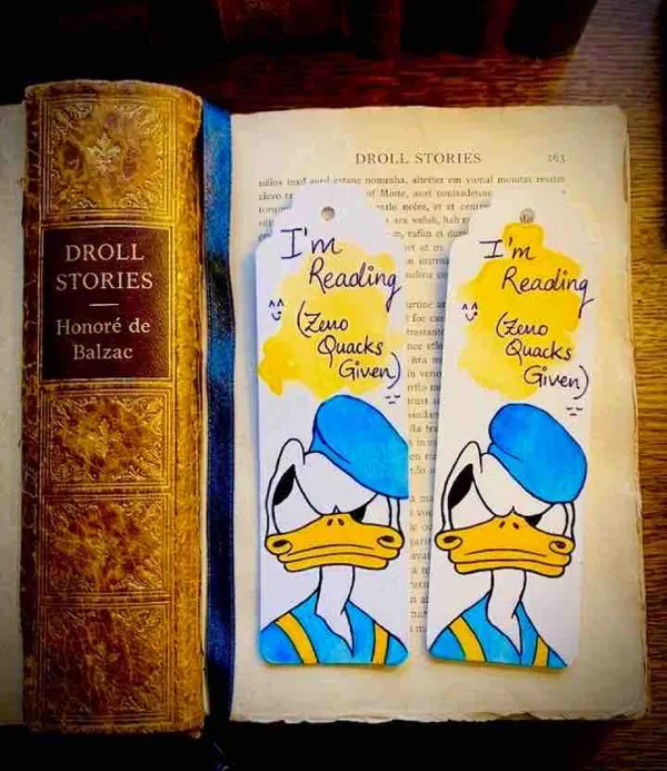 Blue_Duck_Cartoon_Reading_Paper_Bookmarks