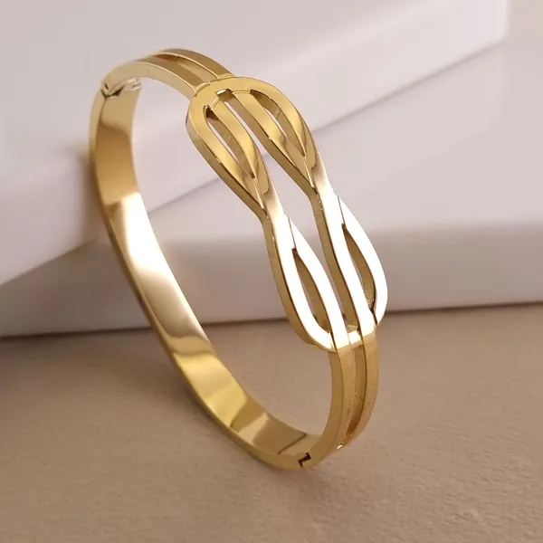 Gold_Stainless_Steel_Intertwined_Loop_Cuff_Bracelet_For_Women