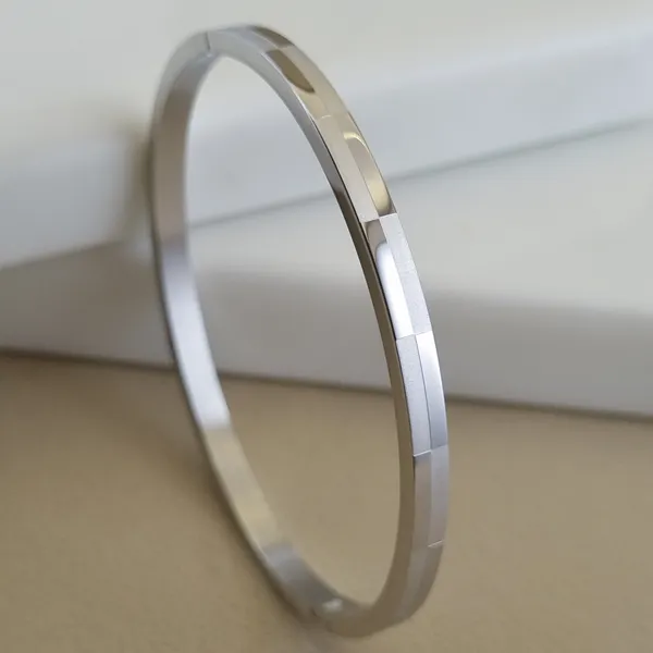 Silver_Stainless_Steel_Prism_Geometric_Bangle_For_Women