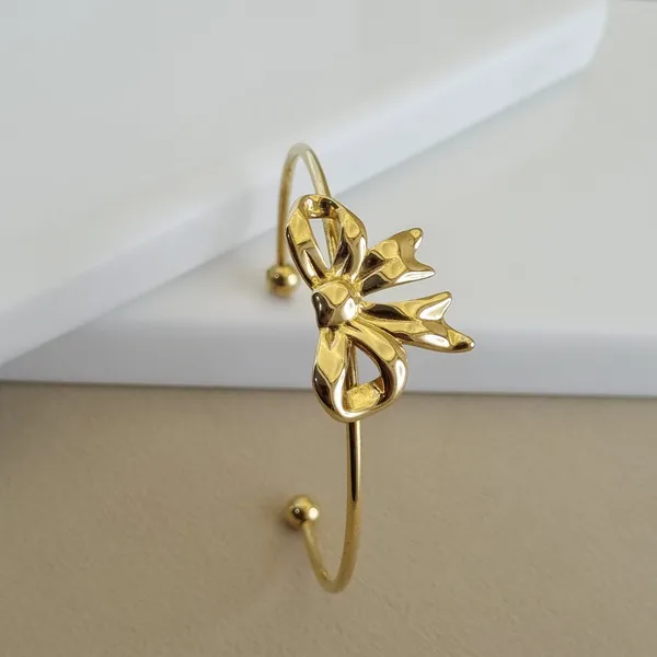Gold_Stainless_Steel_Sculpted_Bow_Cuff_Bangle_For_Women