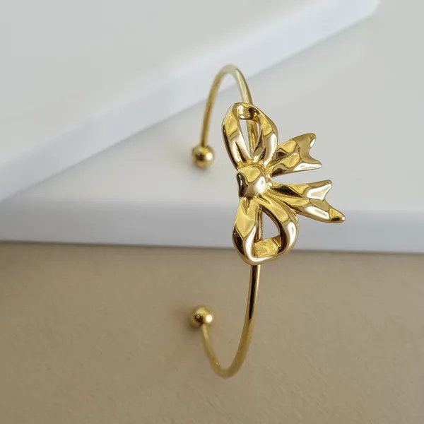 Gold_Stainless_Steel_Sculpted_Bow_Cuff_Bangle_For_Women