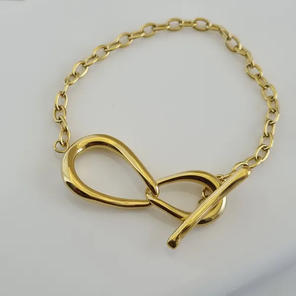 Gold_Stainless_Steel_Infinity_Toggle_Bracelet_For_Women