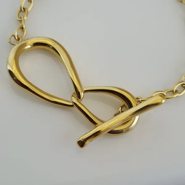 Gold_Stainless_Steel_Infinity_Toggle_Bracelet_For_Women