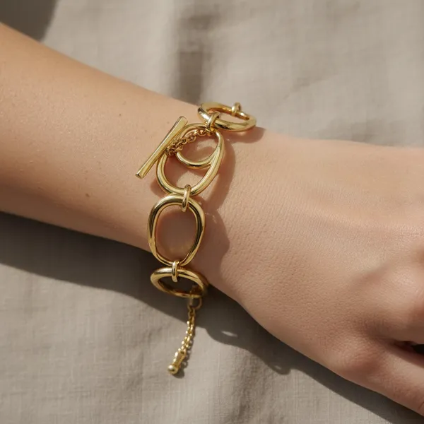 Gold_Stainless_Steel_Sculptural_Ovoid_Toggle_Bracelet_For_Women