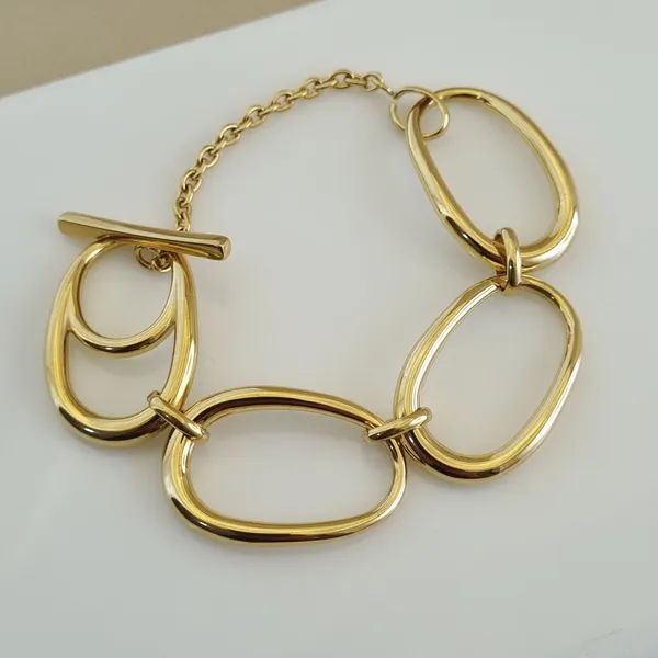 Gold_Stainless_Steel_Sculptural_Ovoid_Toggle_Bracelet_For_Women