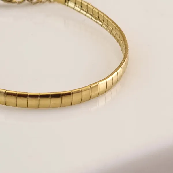 Gold_Stainless_Steel_Serpentina_Curve_Bracelet_For_Women