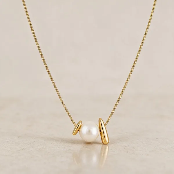 Gold_Stainless_Steel_Sculptural_Pearl_Pendant_Necklace_For_Women