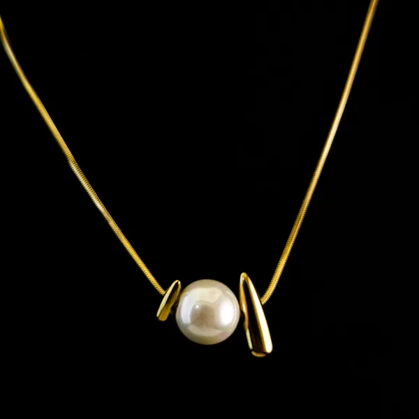 Gold_Stainless_Steel_Sculptural_Pearl_Pendant_Necklace_For_Women