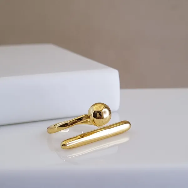 Gold_Stainless_Steel_Orb_And_Bar_Ring_For_Women