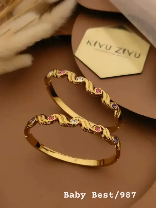 Gold_Plated_Stainless_Steel_Stone_Studded_Wave_Bangles_For_Girls