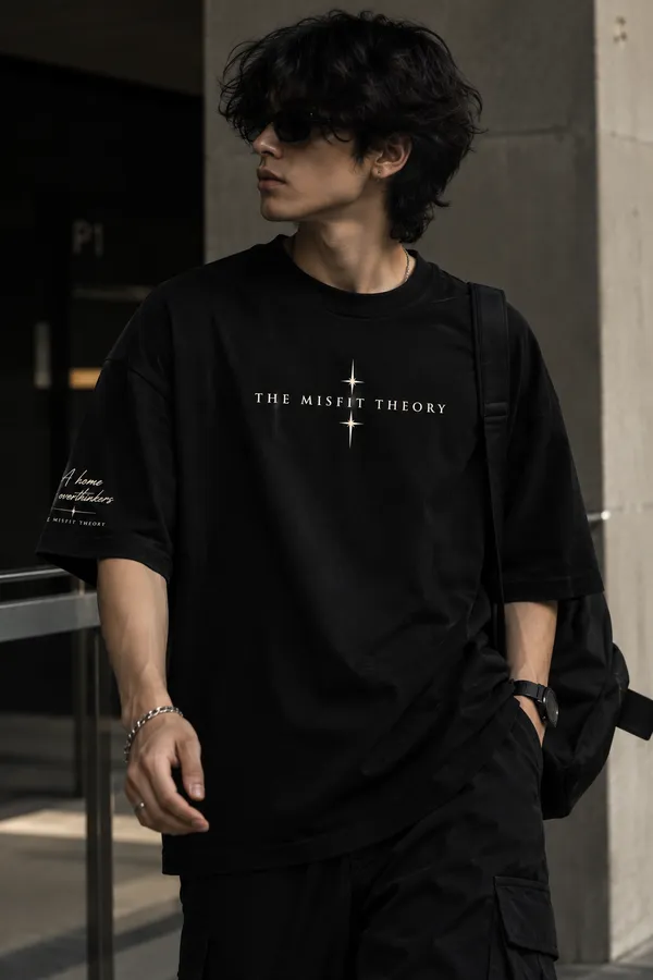 Between_Stars_Unisex_Oversized_Logo_T-Shirt_–_Black