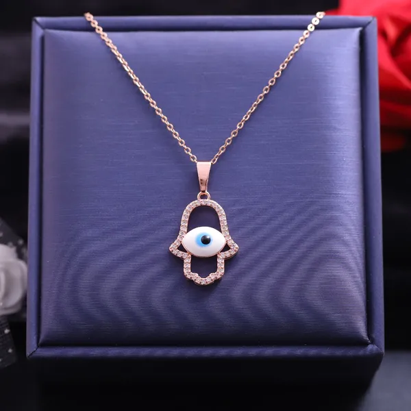 Rose_Gold_Tone_Hamsa_Evil_Eye_Pendant_Necklace