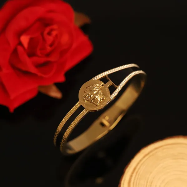 Gold_Tone_Lion_Motif_Bangle_for_Women