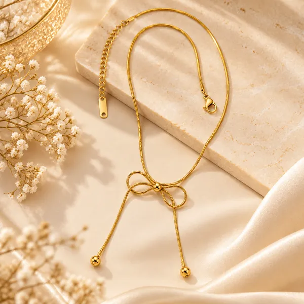 Celeste_Bow_Pendant_Necklace_18k_Gold_Plated_Default_Title