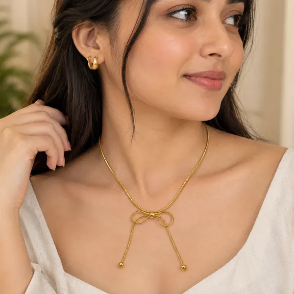 Celeste_Bow_Pendant_Necklace_18k_Gold_Plated_Default_Title