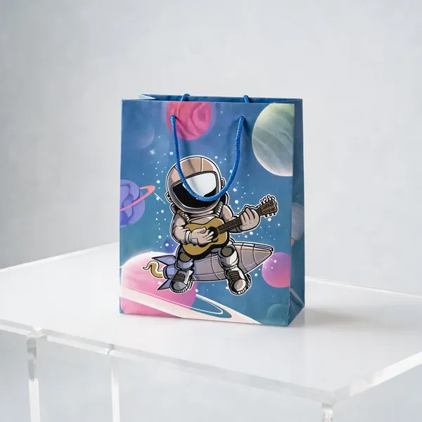 Cosmic_Rockstar_Astronaut_Paper_Gift_Bag_With_Rope_Handles
