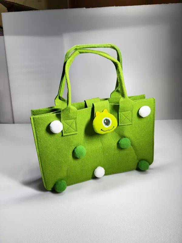 Cute_Felt_Hamper_Gift_Bag_for_Kids_|_Reusable_Tote_Bag_Adorable_Soft_Toy_Charm_&_Pom-Pom_|_Spacious_Gift_Basket_for_Birthday,_Raksha_Bandhan,_Return_Gifts,_Picnic,_Lunch_|_28x18_x15_cm_Green_