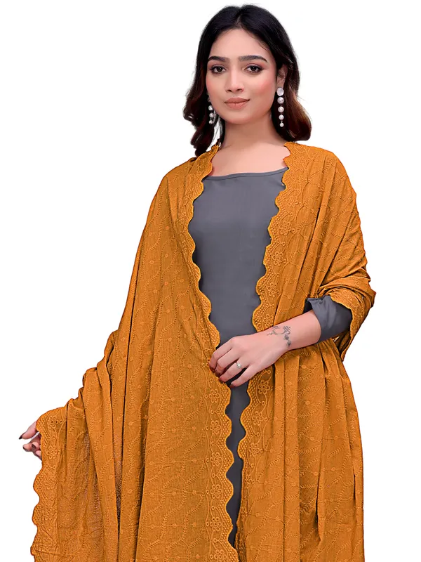Cotton_Schiffli_Dupatta_With_Scalloped_Border_Tassels_Rust