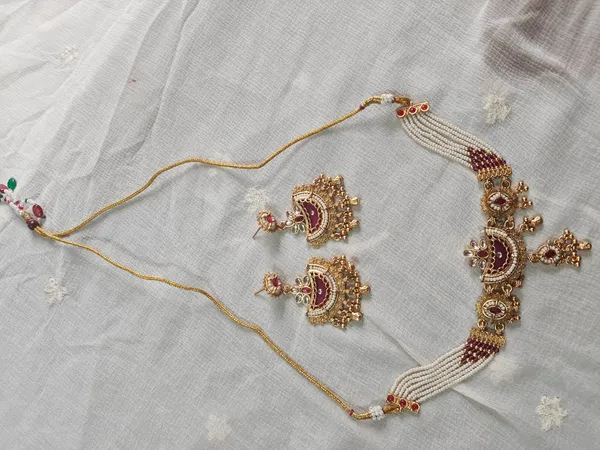 Gold_Tone_Pearl_Embellished_Bajubandh_Set_for_Women