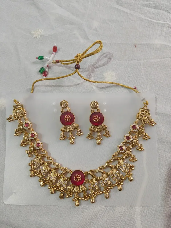Gold_Tone_Temple_Necklace_Set_With_Maroon_Stones_And_Earrings