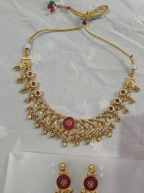 Gold_Tone_Temple_Necklace_Set_With_Maroon_Stones_And_Earrings