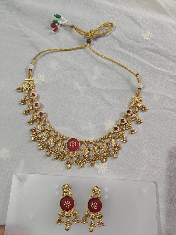 Gold_Tone_Temple_Necklace_Set_With_Maroon_Stones_And_Earrings