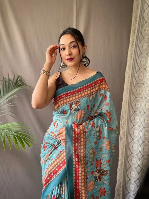 Women_S_Artistic_Terracotta_Orange_Linen_Saree_With_Kalamkari_Inspired_Print_Tassel_Detailing_Perfect_For_Casual_Festivities_Cultural_Events