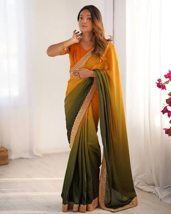 Women_S_Elegant_Ombre_Green_Georgette_Saree_With_Intricate_Golden_Zari_Stone_Embellishments_Complete_With_Heavily_Worked_Blouse_For_Festive_Wedding_Wear