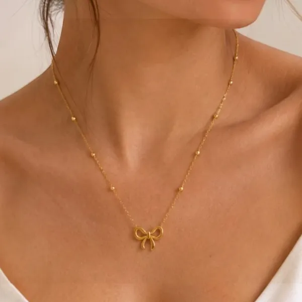 Gold_Stainless_Steel_Bow_Pendant_Necklace_For_Women