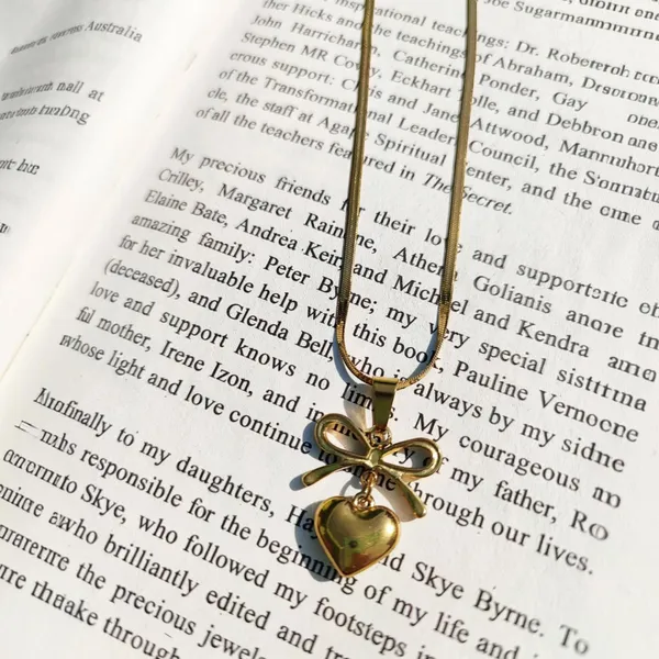 Gold_Stainless_Steel_Bow_Heart_Pendant_Necklace_For_Women