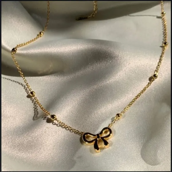 Gold_Stainless_Steel_Bow_Pendant_Necklace_For_Women