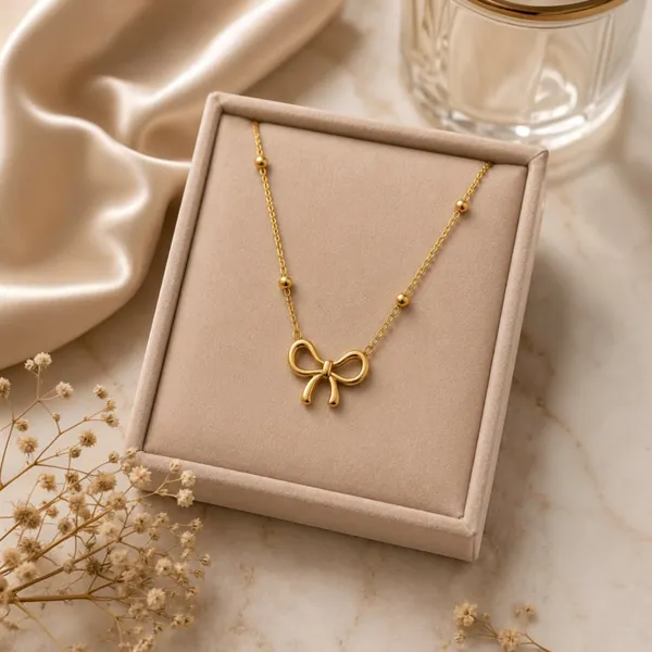 Gold_Stainless_Steel_Bow_Pendant_Necklace_For_Women
