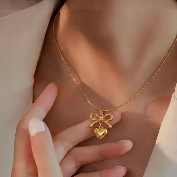 Gold_Stainless_Steel_Bow_Heart_Pendant_Necklace_For_Women