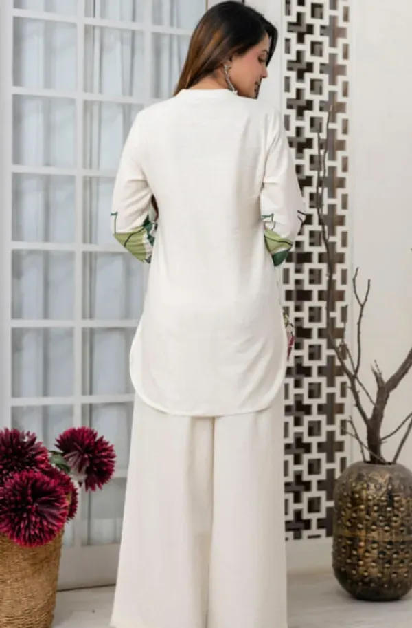 The_Kurta_Features_A_Stylish_V_Notch_Neckline_Three_Quarter_Sleeves_And_A