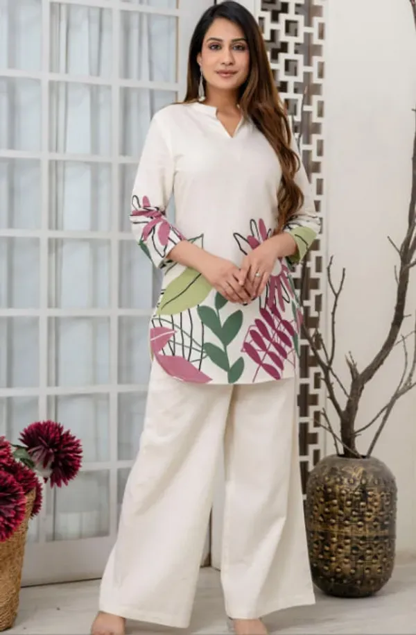 The_Kurta_Features_A_Stylish_V_Notch_Neckline_Three_Quarter_Sleeves_And_A