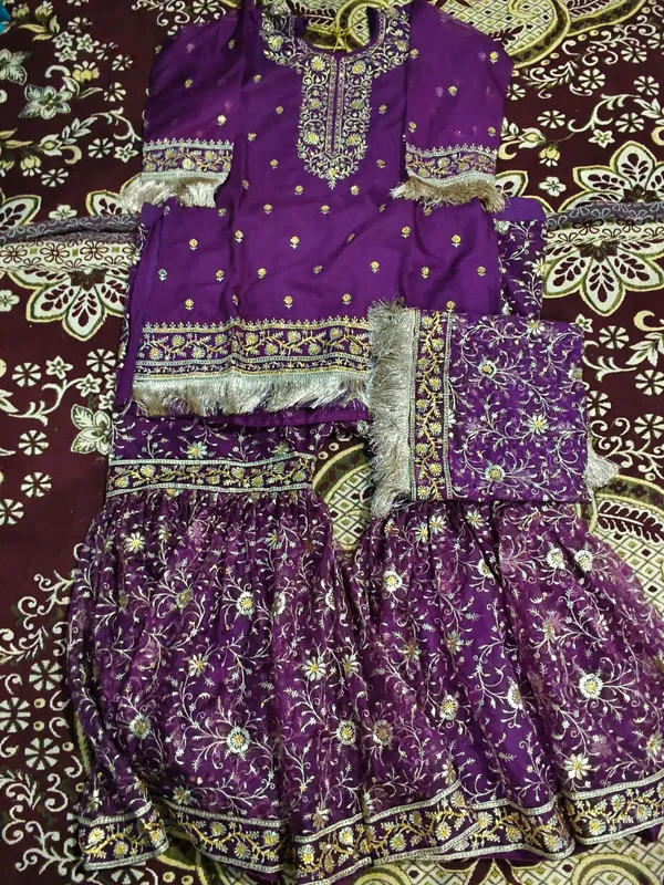 Purple_banarasi__khaddi_silk_unstiched_ghara/_sharara_set.._with_full_jal_emboirdeiry_and_hand_work_on_duppata_,_top_,_bottom