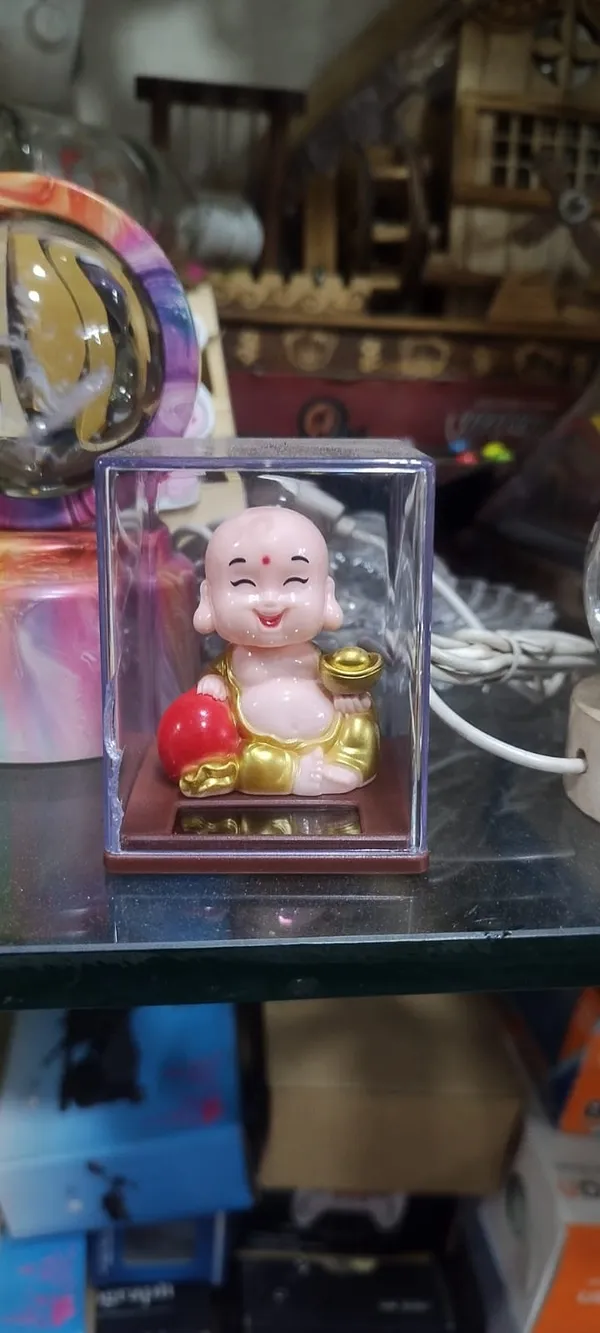 Seated_Laughing_Buddha_Decorative_Figurine