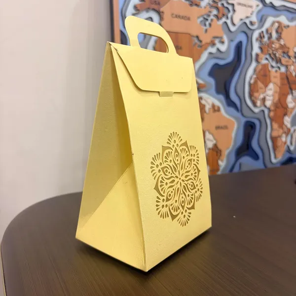Izels_Laser_Cut_Paper_Gift_Box_With_Handle_Pack_Of_25_Decorative_Gift_Boxes_For_Wedding_Favors_Return_Gifts_Eid_Festive_Hampers_Chocolates_Sweets_Corporate_Gifting_16x11x8_Cm_Golden