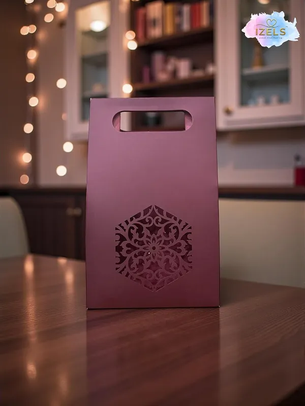 Izels_Laser_Cut_Paper_Gift_Bag_With_Handle_Mandala_Pack_Of_25_Metallic_Textured_Gift_Packaging_For_Eid_Gifts_Wedding_Favors_Return_Gifts_Festive_Corporate_Gifting_12x6x20_Cm_Maroon