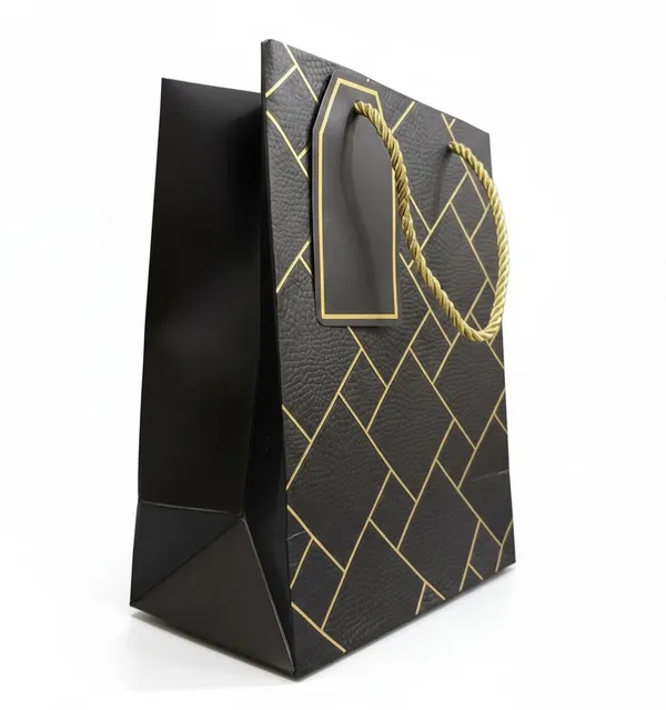Izels_Premium_Luxury_Paper_Gift_Bags_Pack_Of_5_Leather_Finish_With_Gold_Foil_Geometric_Design_Thick_220_Gsm_Paper_Rope_Handles_Thank_You_Tag_Small_18x10x23_Cms_Black