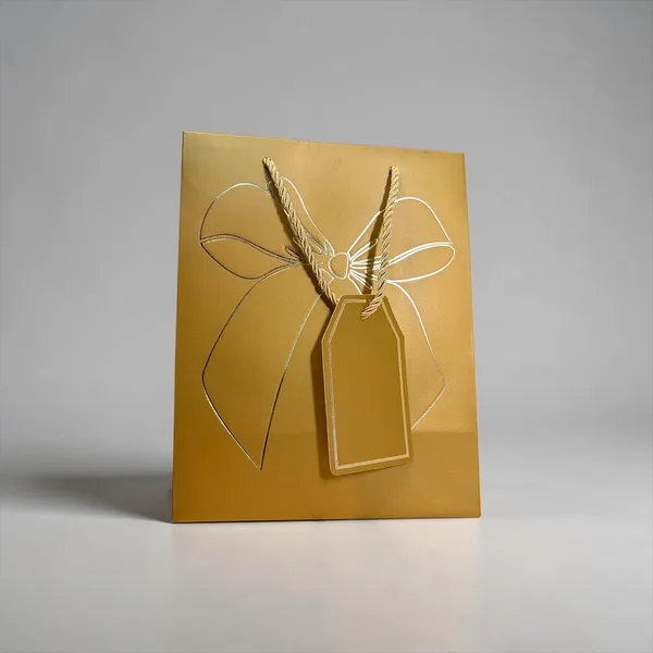Izels_Premium_Golden_Metallic_Paper_Gift_Bag_Small_Luxury_Gift_Bag_With_Gold_Foiling_Bow_Design_Name_Tag_23x18x10_Cm_Paper_Bag_For_Wedding_Birthday_Return_Gifts_Festive_Corporate_Gifting_Pack_Of_10