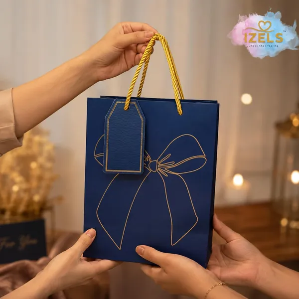 Izels_Metallic_Gift_Bag_With_Gold_Foiling_Bow_23x18x10_Cm_Blue_10_Pieces